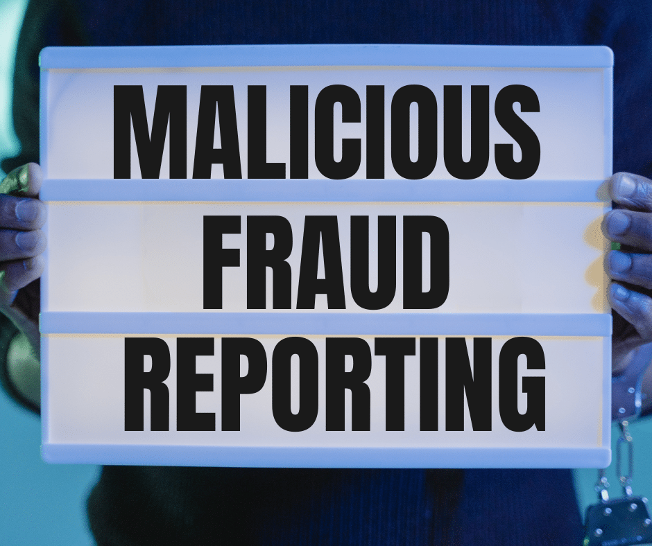 Malicious Fraud Reporting in black text on a lightboard